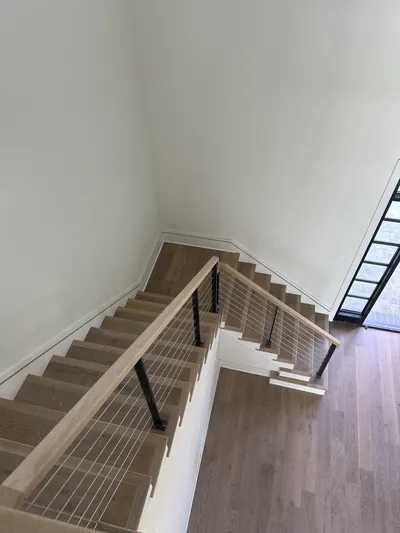 Overhead view of a cable-railing staircase